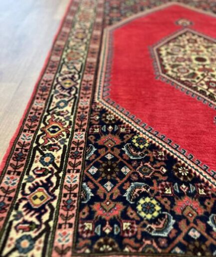 Ornate red and patterned rug