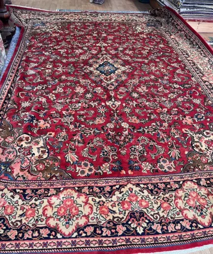 Intricate red floral patterned rug