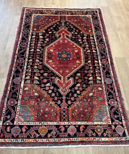 Intricate patterned traditional Persian rug.