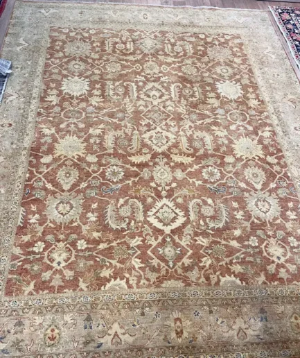 Ornate vintage rug with intricate patterns.