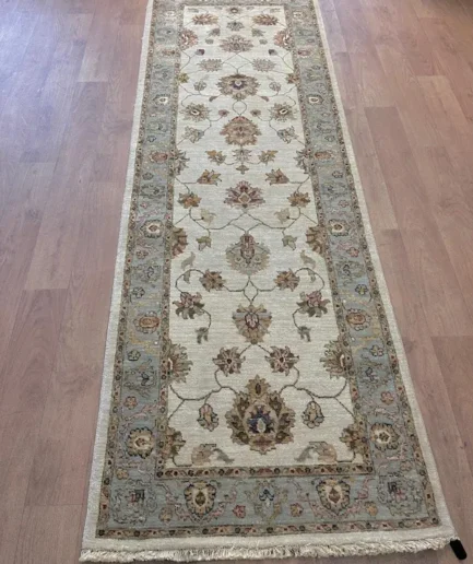 Elegant patterned runner rug on floor
