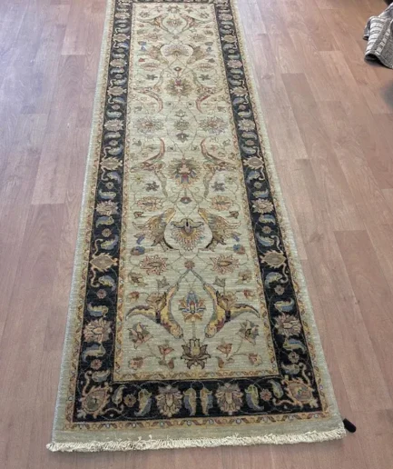 Elegant patterned runner rug on floor