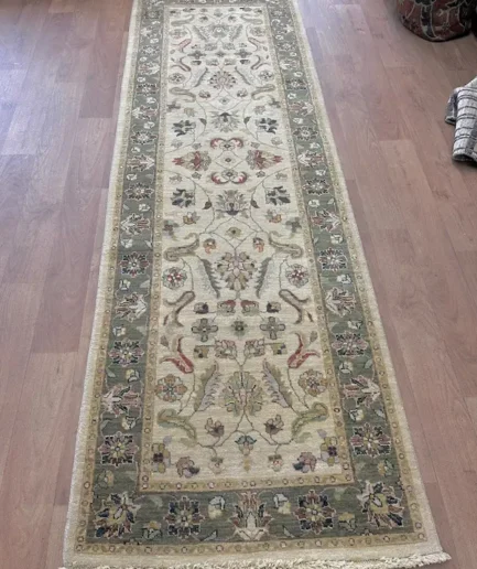 Elegant patterned runner rug on floor
